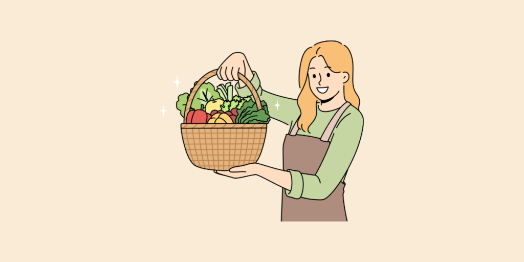 野菜を持つ女性